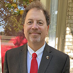 Richard Hughes smiles in a snapshot taken when he's an adult