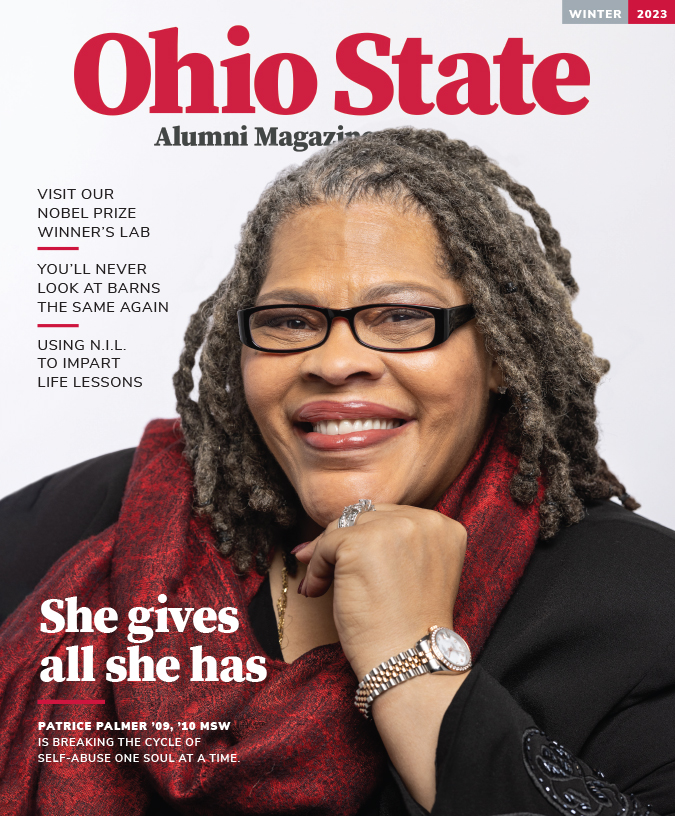 On the cover of the winter 2023 edition of Ohio State Alumni Magazine, Patrice Palmer, a two-time graduate of the College of Social Work, smiles in a confident and sincere way—her eyes crinkling show it’s a true smile. She’s a Black woman with pretty makeup and shoulder-length hair wearing a dressy scarf, glasses, watch and ring. The sleeve of her black suit jacket has some shiny beadwork.