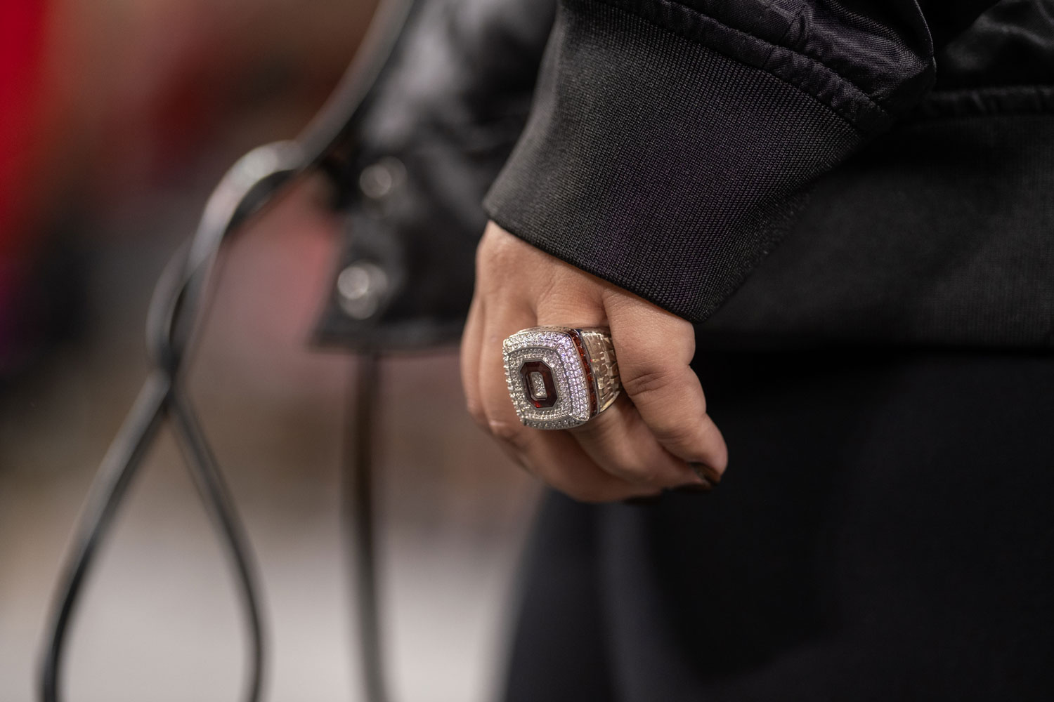 Melissa's national championship ring is big. There are rows of diamond set around a block O, a shape reminiscent of a stadium.