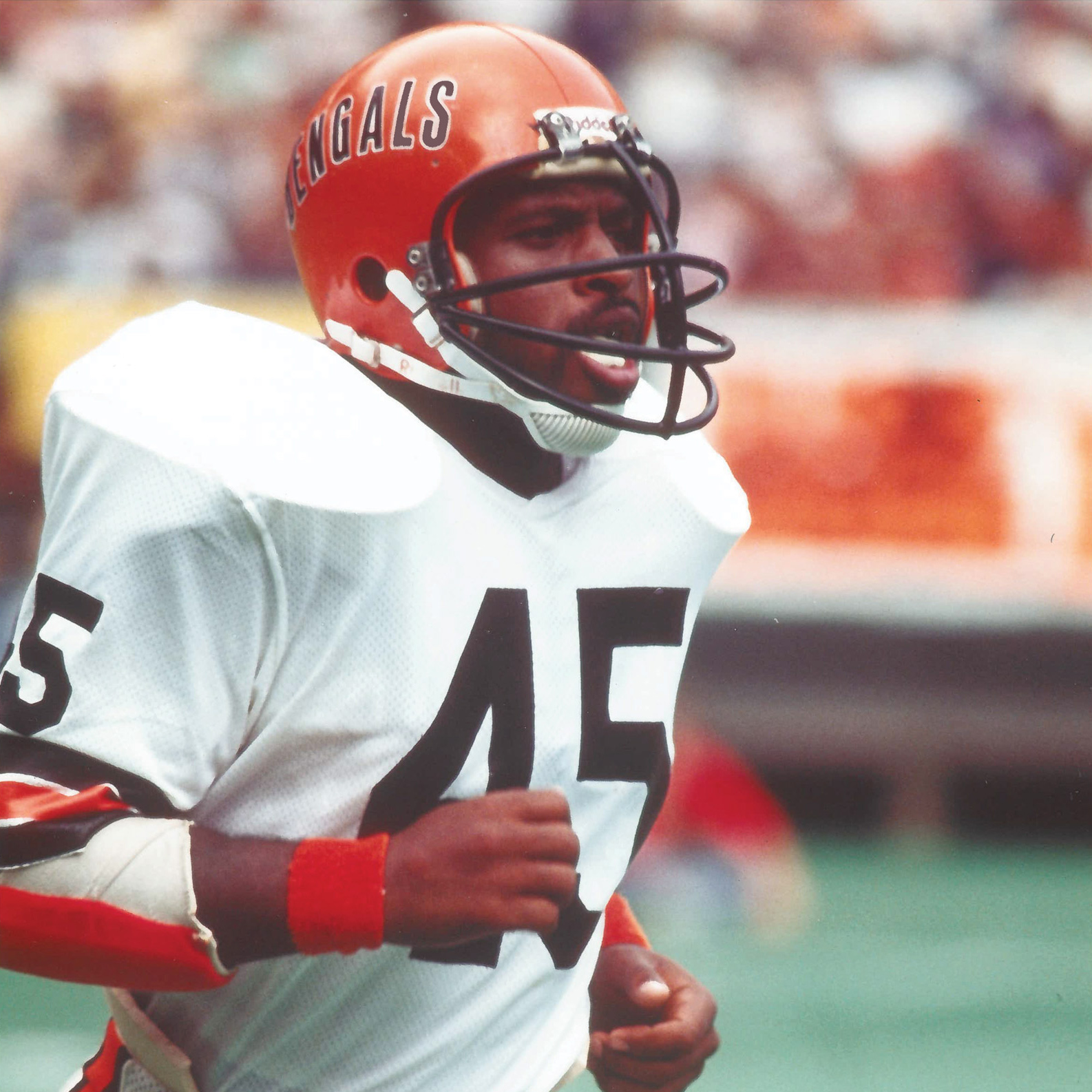 Griffin is shown running while wearing a Cincinnati Bengals uniform, including helmet.