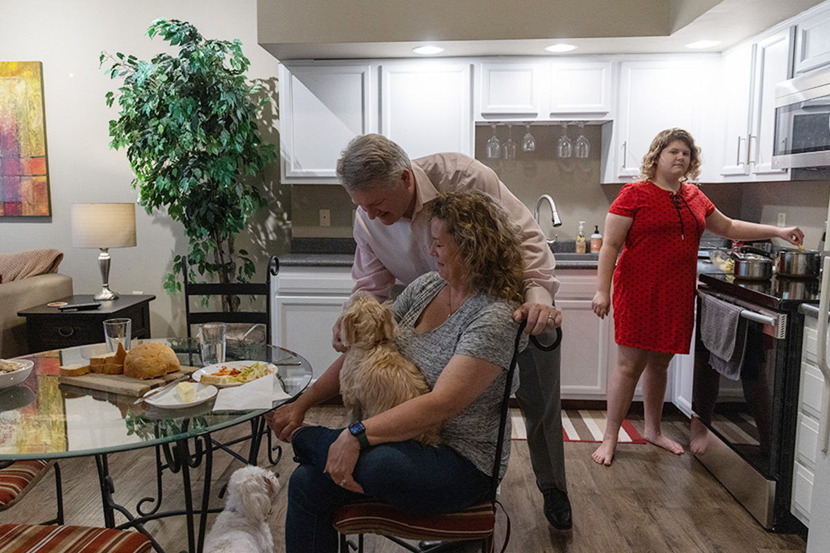 Whittington breaks from his daily routine for dinner with his wife and daughter at their downtown condo