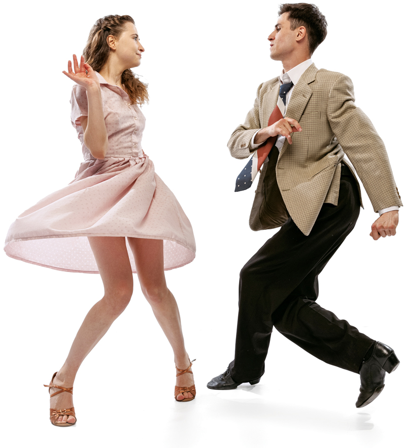 A woman and a man facing each other and enthusiastically dancing