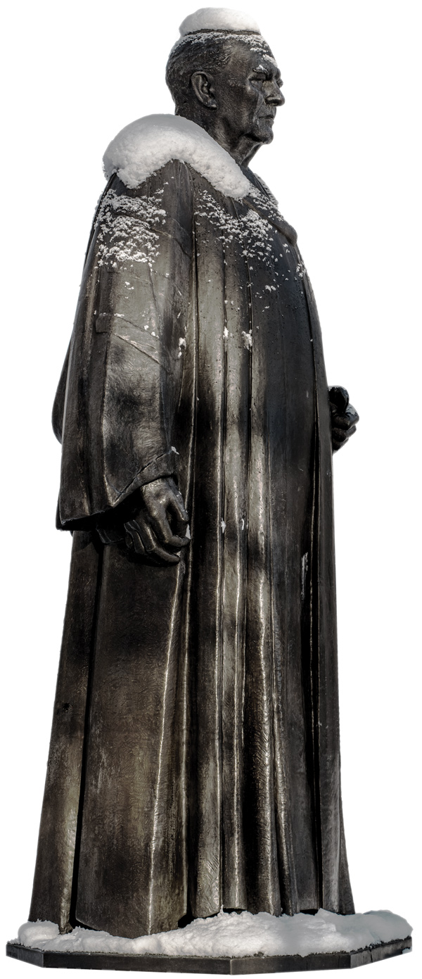 Snowy statue of a former Ohio State president on the Oval 