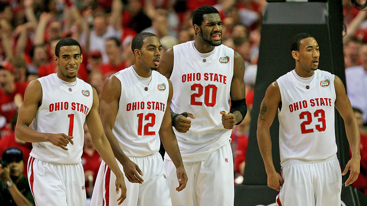 Amid a game, four Black Ohio State basketball players walk together up the key on the court. They wear white uniforms and their sweat indicates they’ve been fighting hard, and are proud of it. But they’re not done yet.