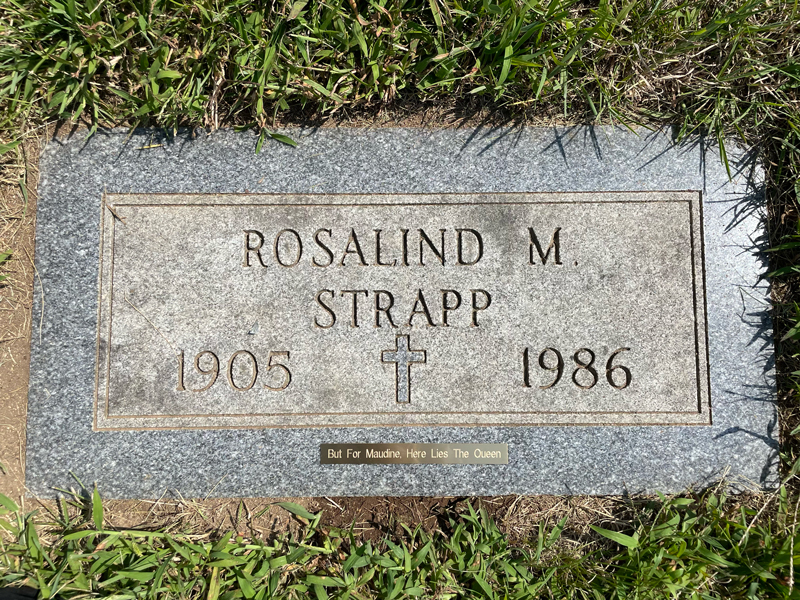 A photo of a gravestone gives Strapp's name, lifetime and has a small plaque that reads: But for Maudine, here lies the queen.