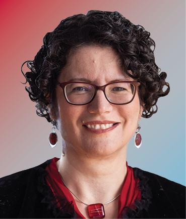 Tanya Berger Wolf smiles in this headshot. She wears glasses, dangly earrings and necklace, and a scarlet shirt and black jacket.