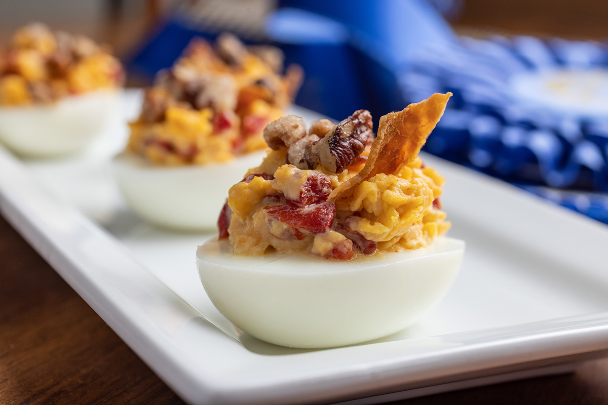 Pimento Deviled Eggs with Pecans and Bacon