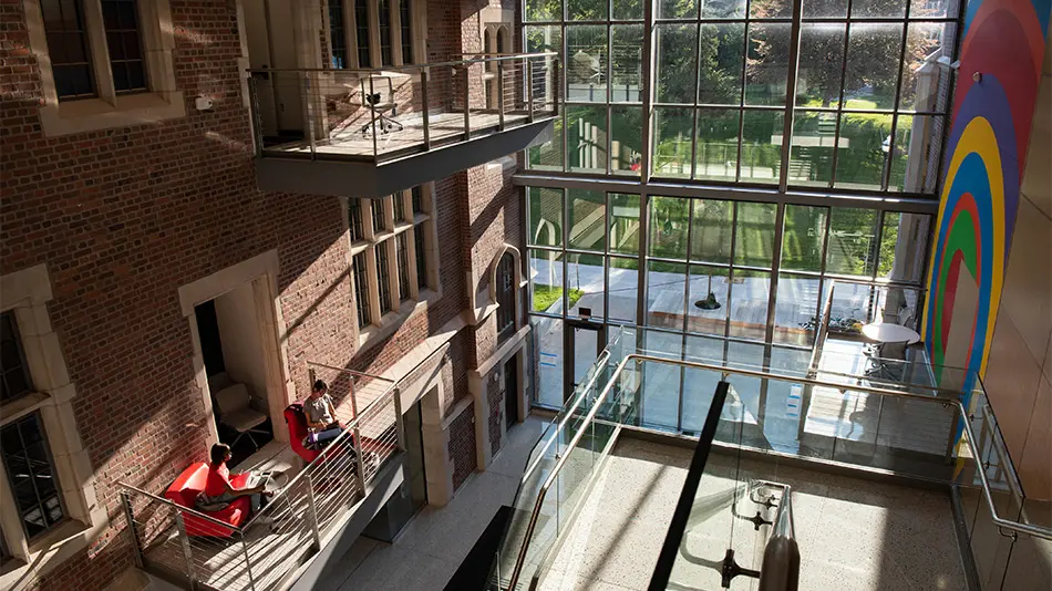 interior of Pomerene Hall showing the old brick with new glass exterior