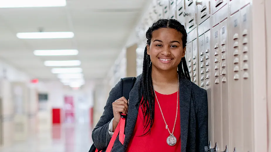 portrait of lizzie chung in school hallway