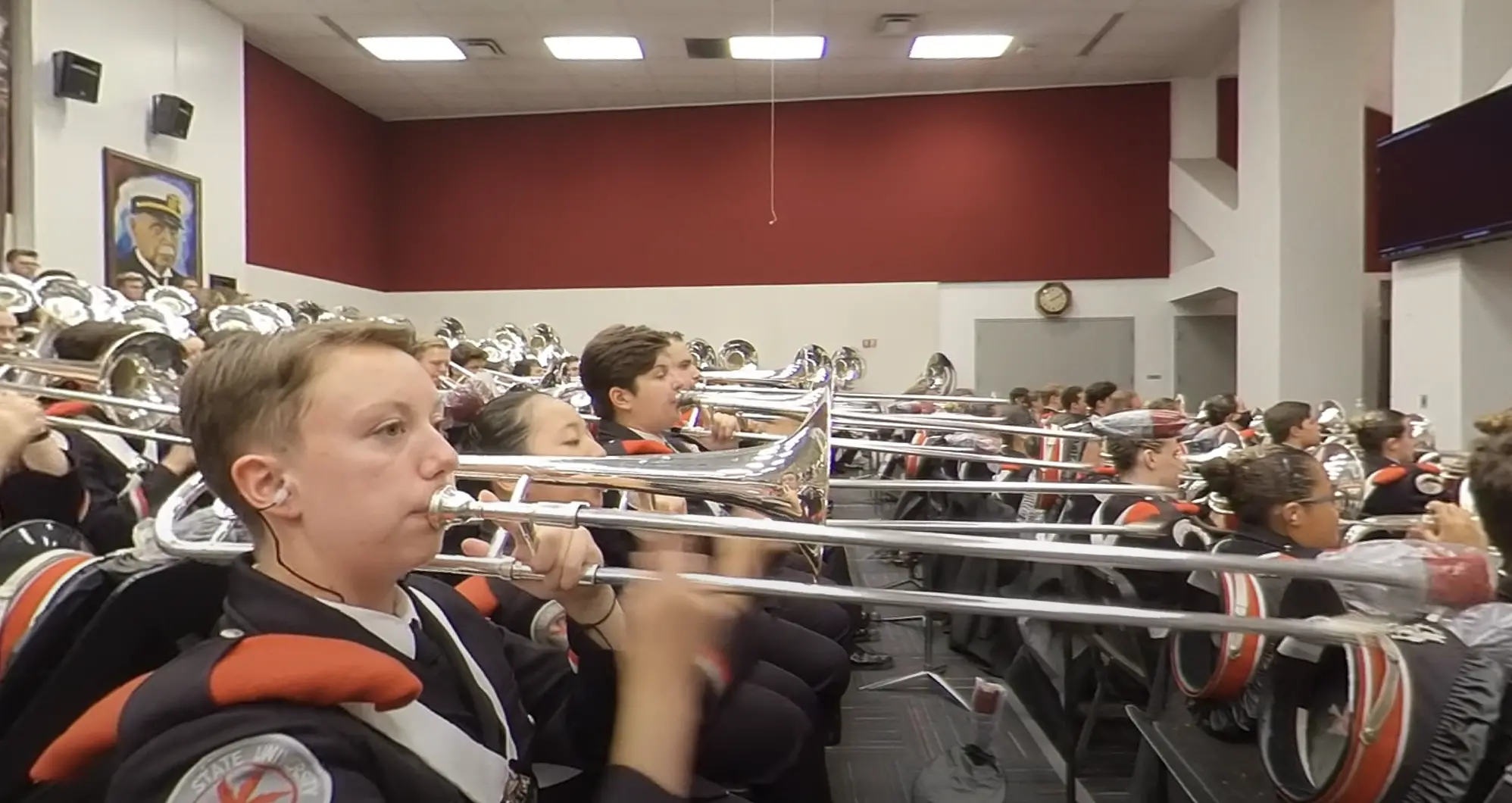 Ohio State University Marching Band as it practices “Buckeye Battle Cry” in the Ohio Stadium Rehearsal Hall.