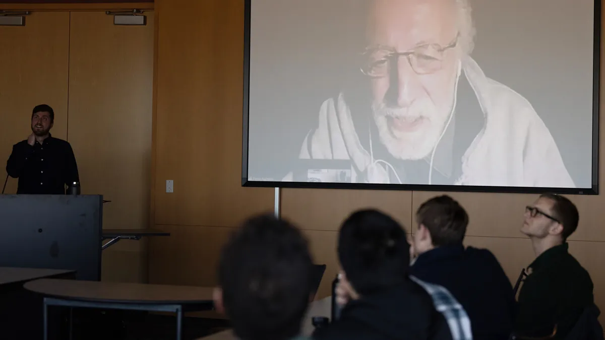 Nobel Prize winner Pierre Agostini talks on Zoom during a meeting of the research group he leads with Lou DiMauro and one led by Sasha Landsman.