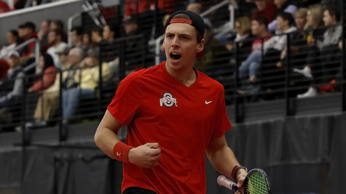 Andrew Lutschaunig gets fired up after a tennis play.