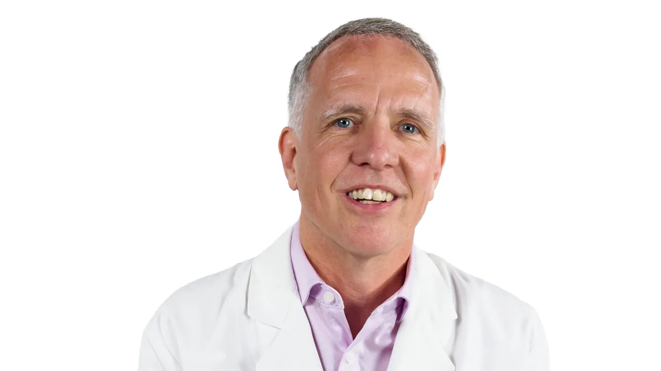 Dr. Roman Skoracki smiles as he talks about his work