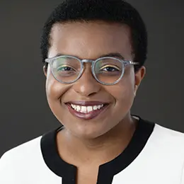 An image of Ose Arheghan, a Black person with glasses