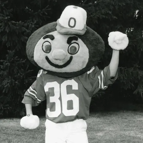 A fuzzy Brutus has a big smile and a football jersey with the number 36