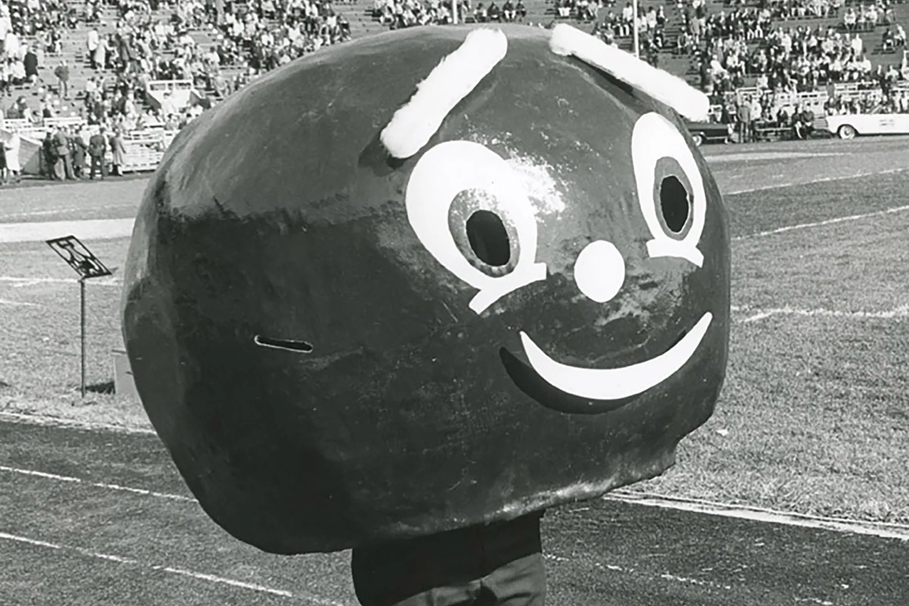 The original Brutus Buckeye was a smooth giant head with a paper smile and big eyes.