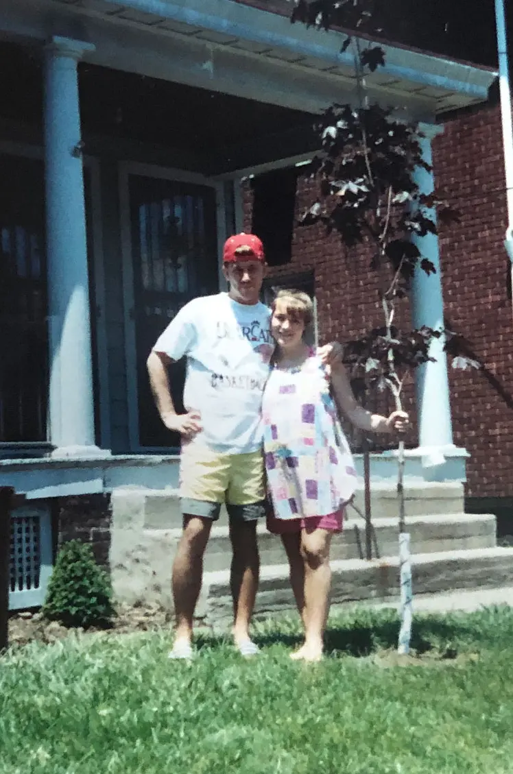 Marty and Charity Gruenwald standing on front lawn