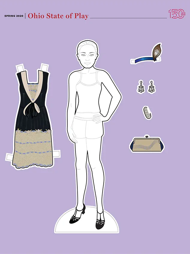 female paper cut out doll iwth a tan and brown dress a headband and jewelry
