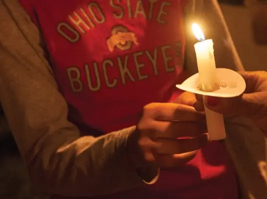 Ohio State students at a candlelight vigil
