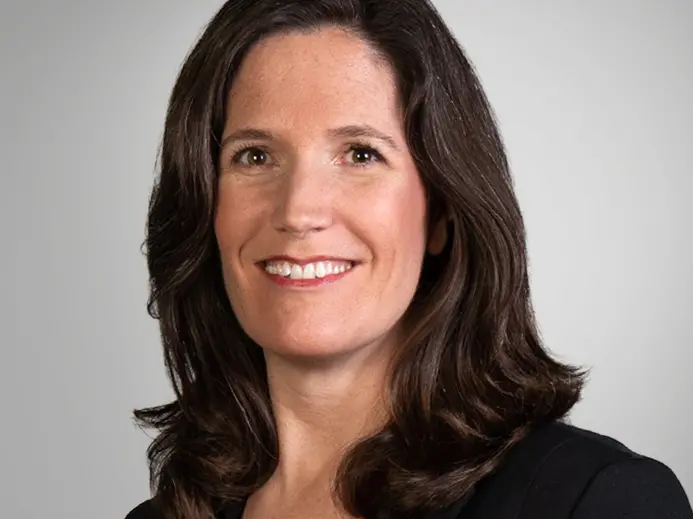 portrait of Janelle Jordan in a black top smiling