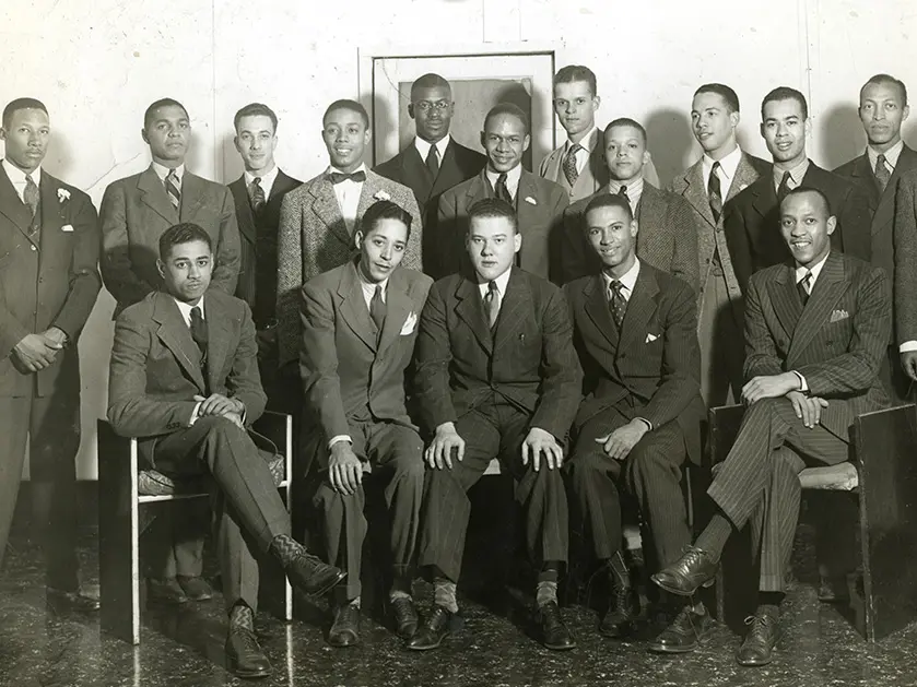 old black and white photo of a group of black men in suits