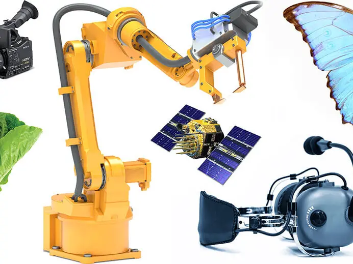 a collage of objects showing a robotic arm, video camera, butterfly, and plant
