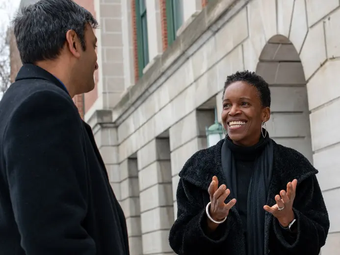 Provost Melissa L. Gilliam talking with faculty member Ajit Chaudhari and Susan Cole