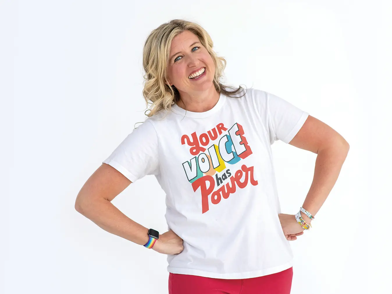 Katie Silcott wears a t-shirt reading &quot;Your voice has power.&quot;