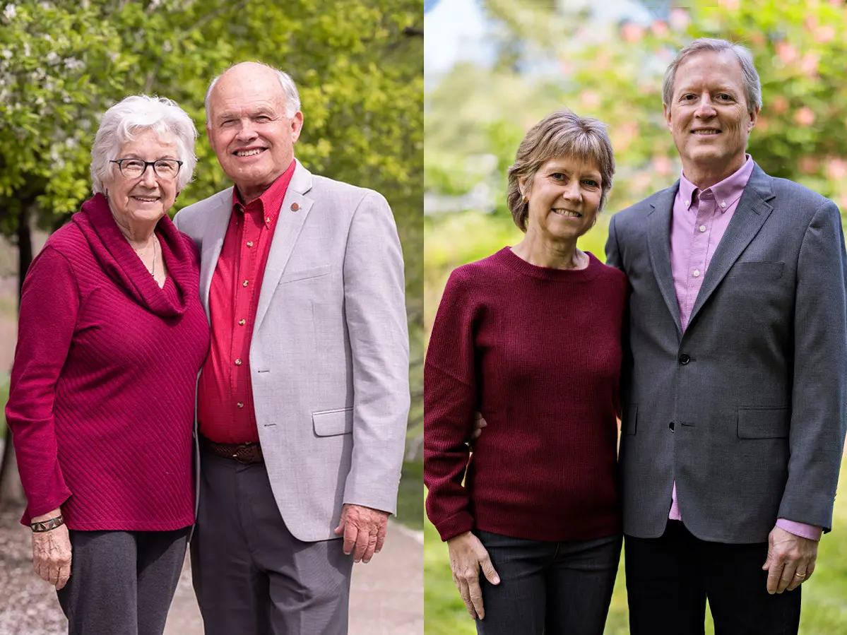 Left: An older man and woman stand close to each other, with their arms wrapped behind each other’s backs. They look friendly and both have white hair, smiles and similar outfits: scarlet shirts and gray pants, though he has added a gray sports jacket. Right: A middle-aged couple stand closely while holding hands. The woman smiles big enough that you can see her teeth; her husband has a closed-lip smile, but both have smiling eyes, too.
