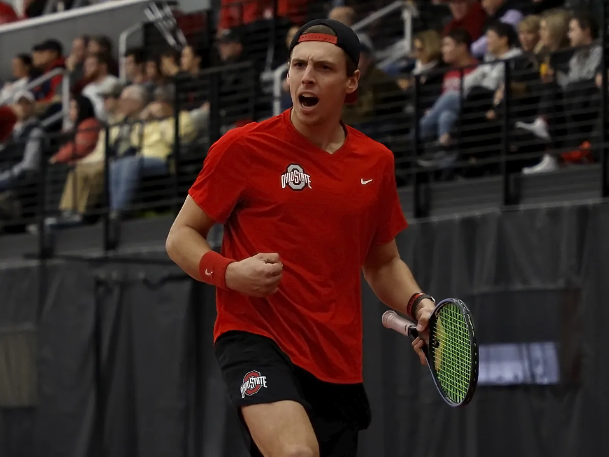 Andrew Lutschaunig gets fired up after a tennis play.