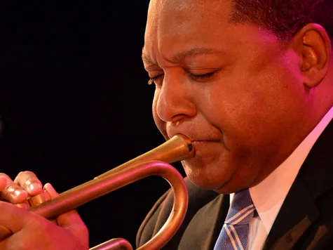 Wynton Marsalis plays his trumpet
