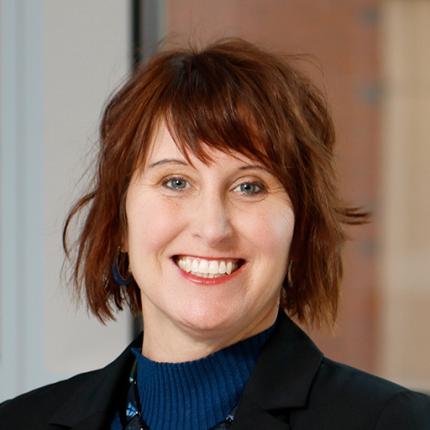 Photo portrait of KELLI TRINOSKEY